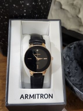 Armitron Black Dial Watch with Gold Casing & Diamond Accent